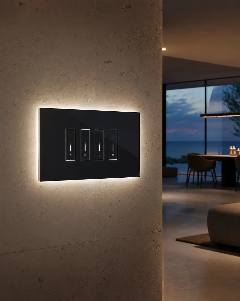 iotty 4-gang · black glass smart switch, backlit on a plaster wall